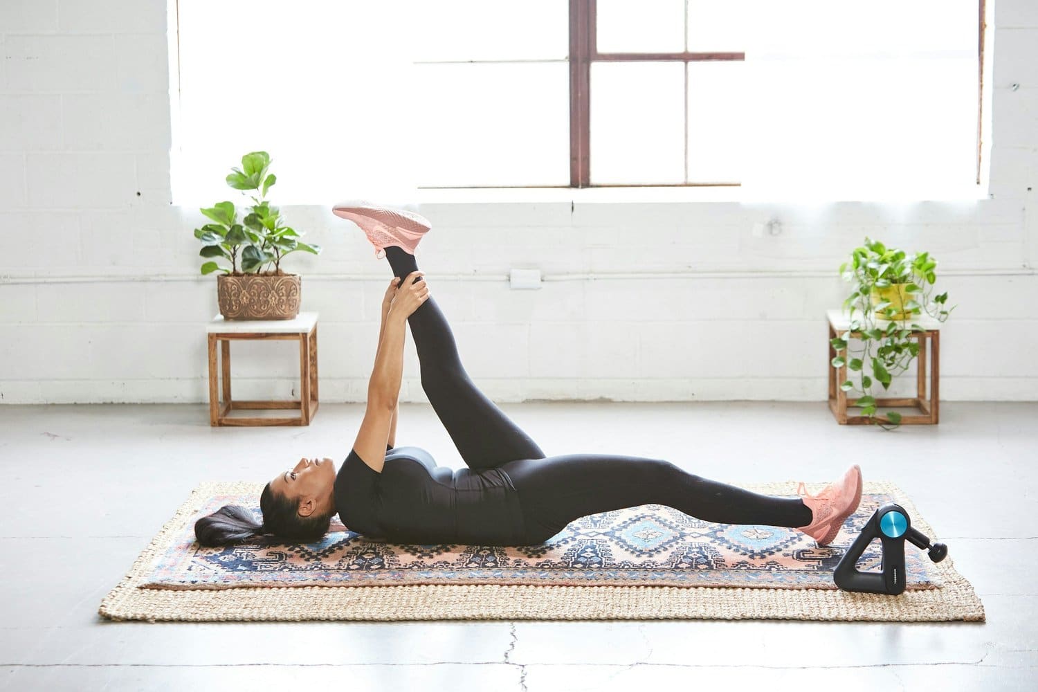 Person following along with an online exercise video without feedback on their form