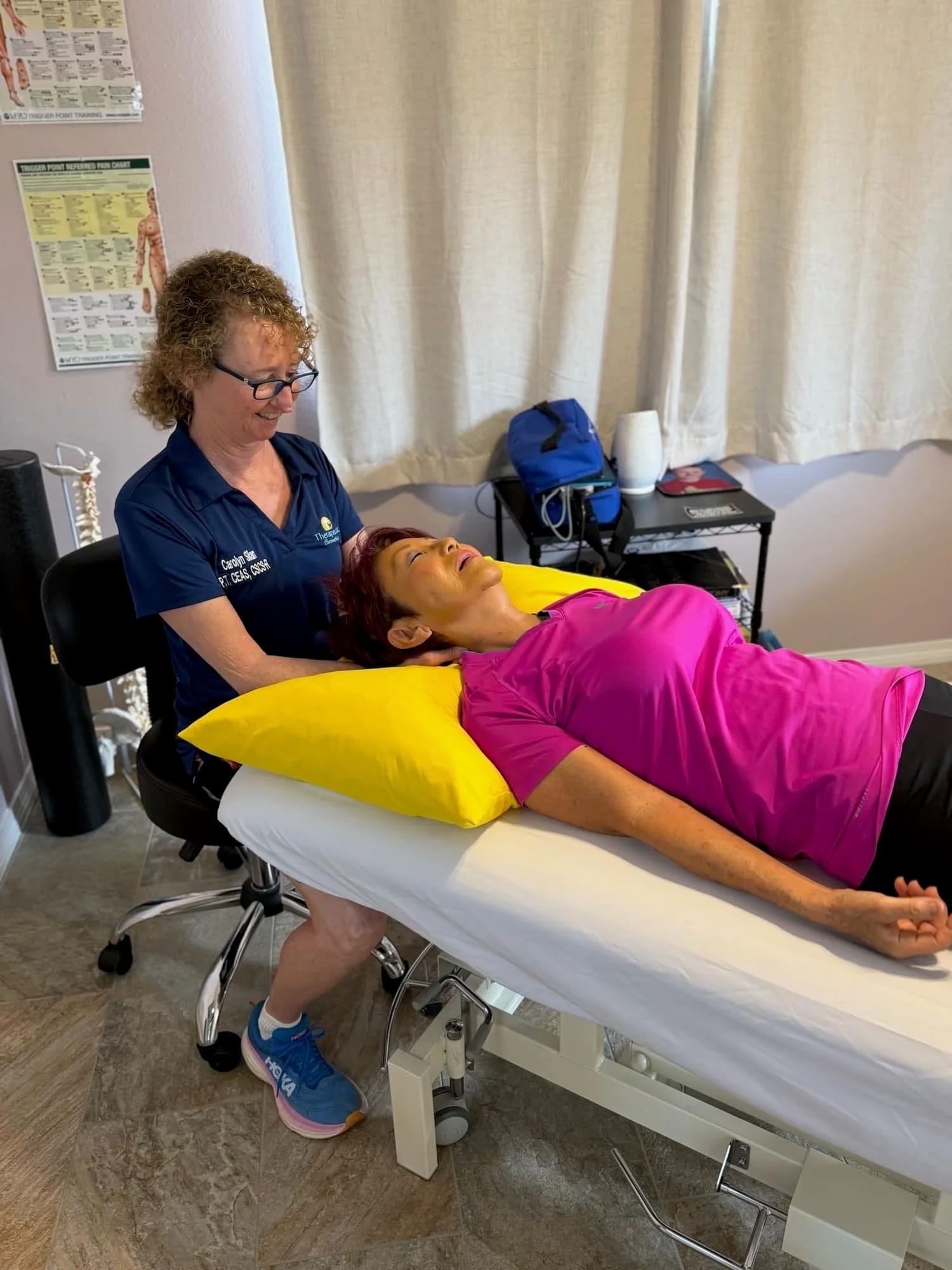 Carolyn Silan, PT treating a patient